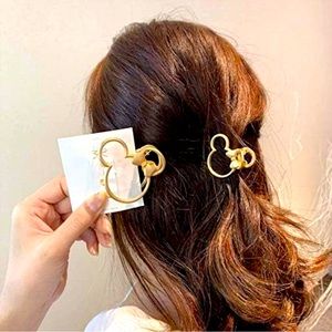 Disney Minnie Mouse Gold metal hair clips.